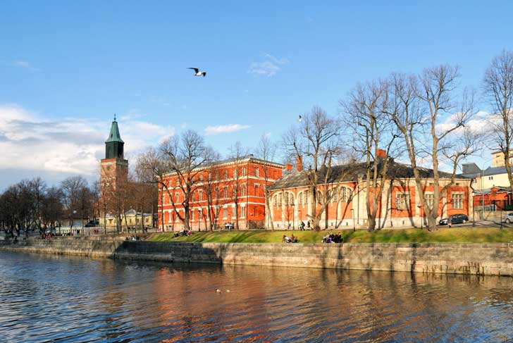sunny-evening-in-turku-finland-embankment-of-the-river-aurajoki-1600x1071